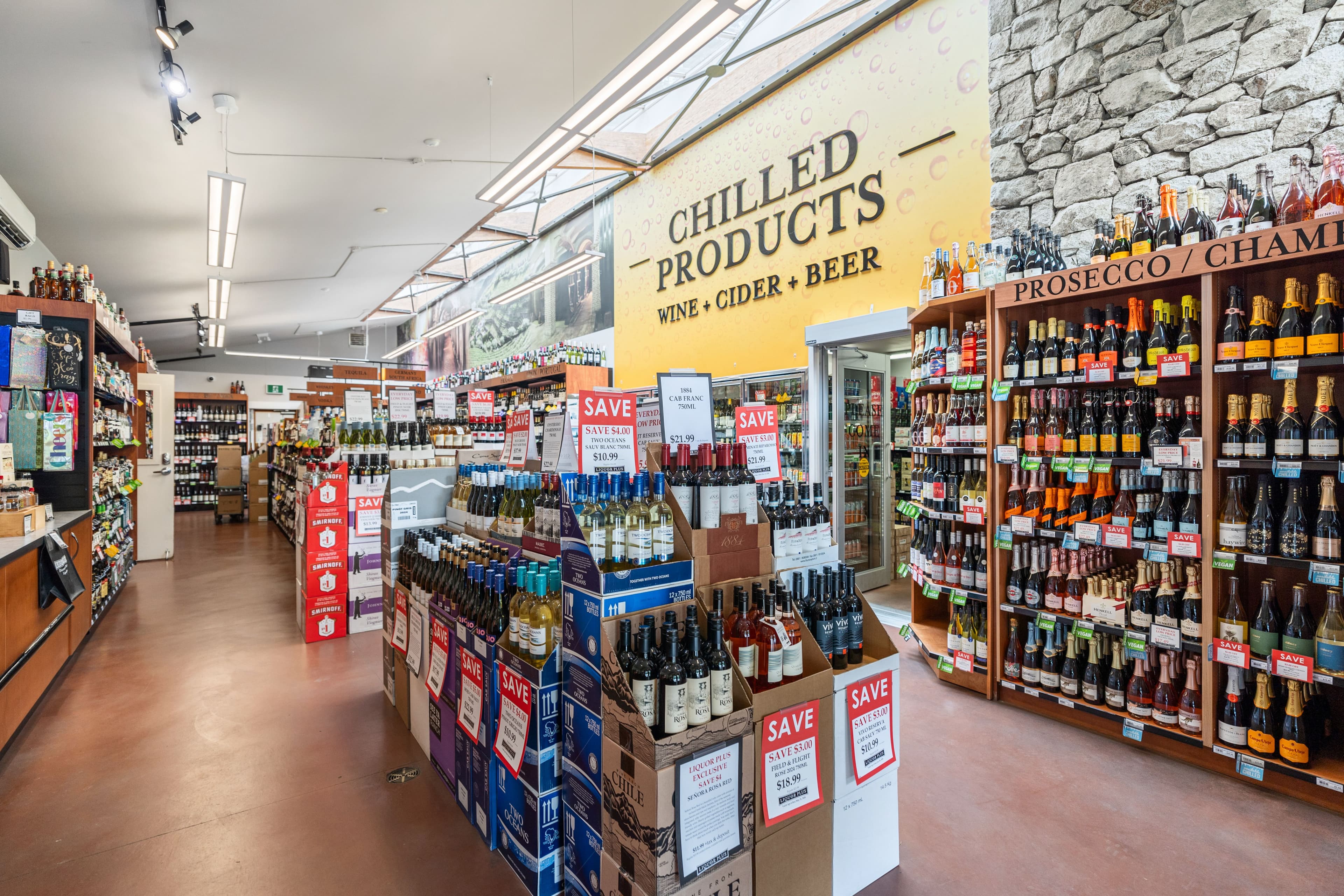 BC/VQA wine wall with rows of bottles and shelf-talker tags