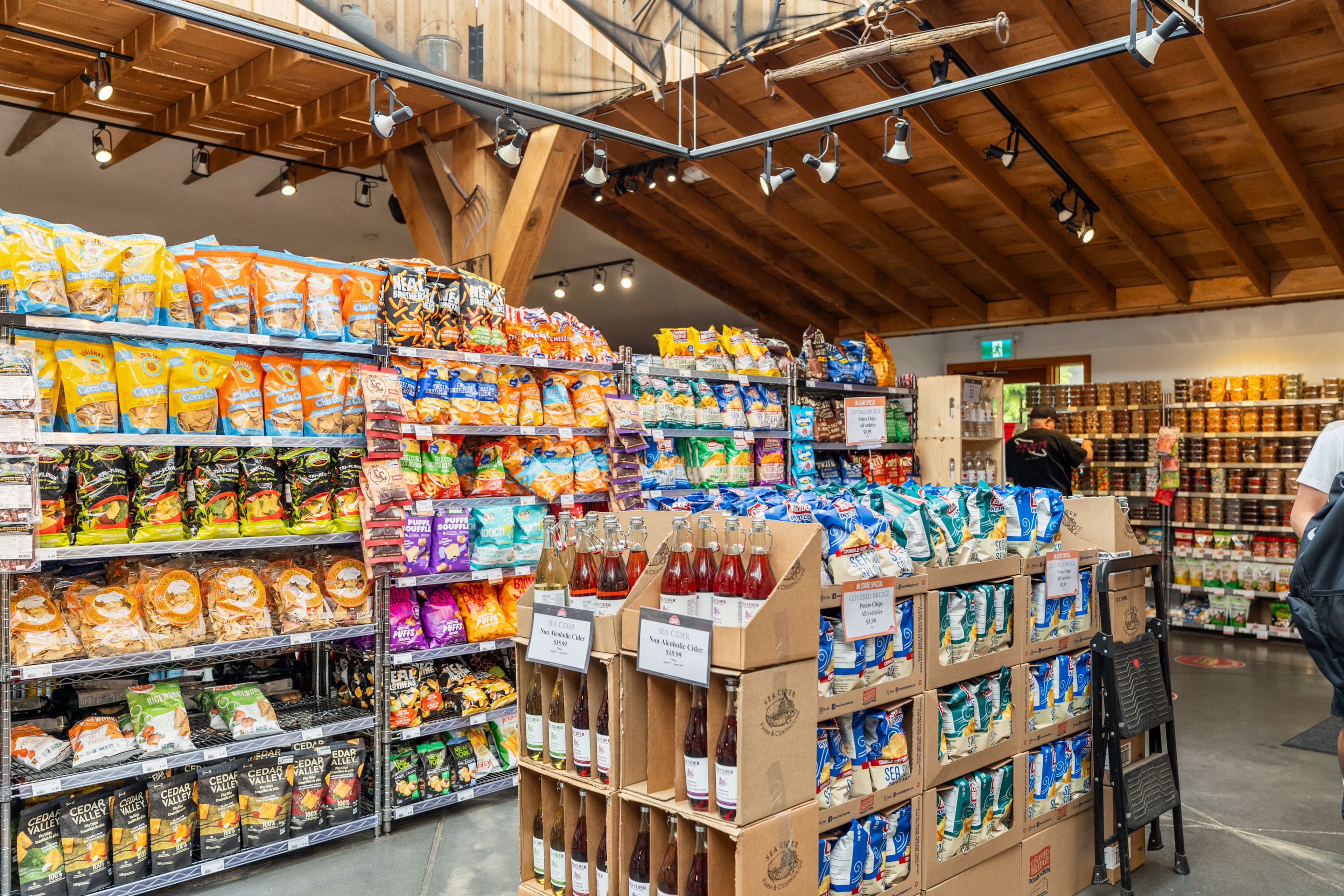 Snacks aisle with chips, drinks and pantry favourites
